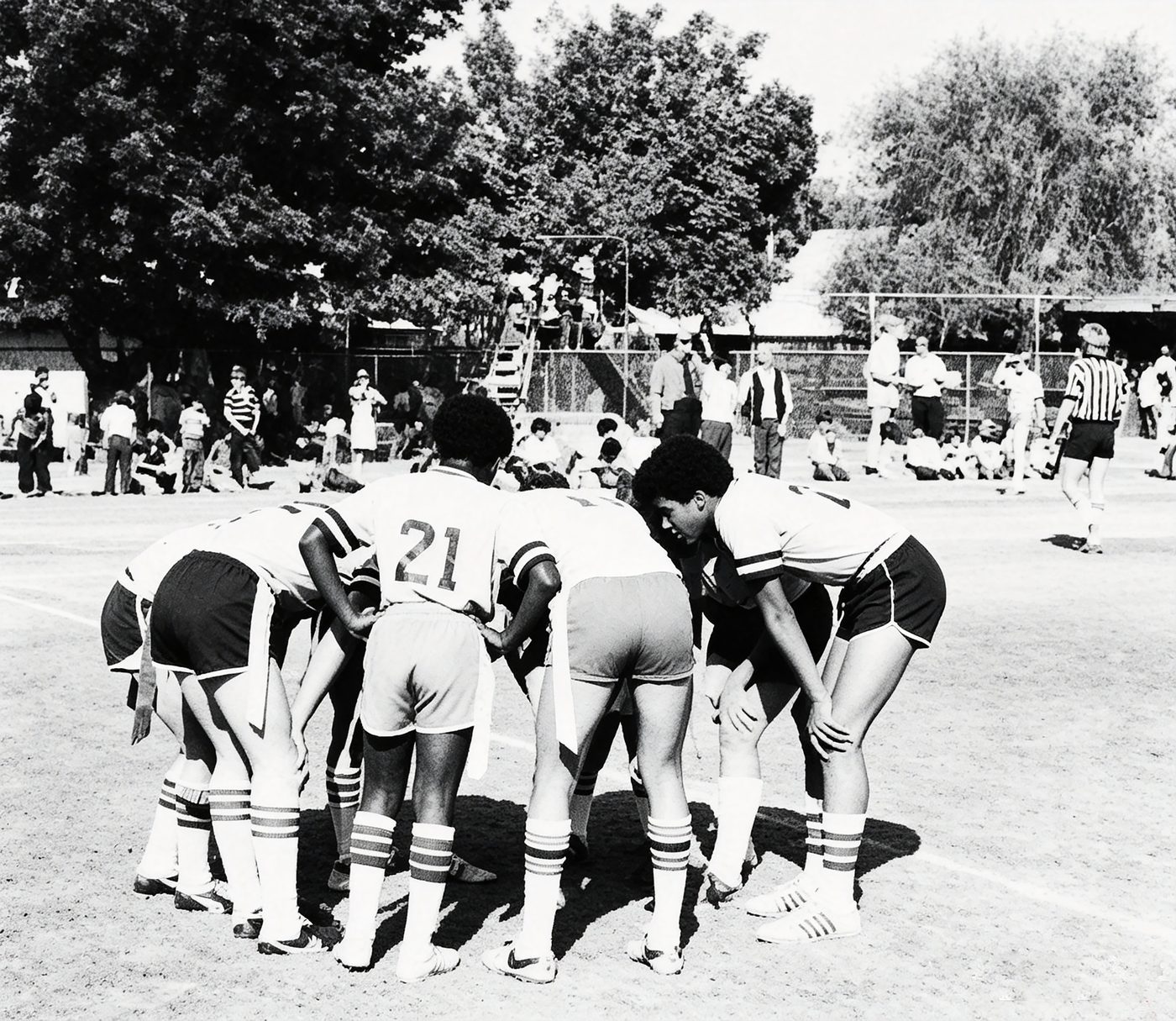 South Hills Academy players huddle during a soccer match